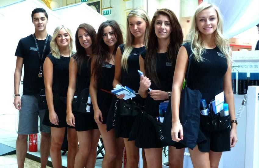 iMP Leeds promo staff demonstrating new tanning products for St.Tropez