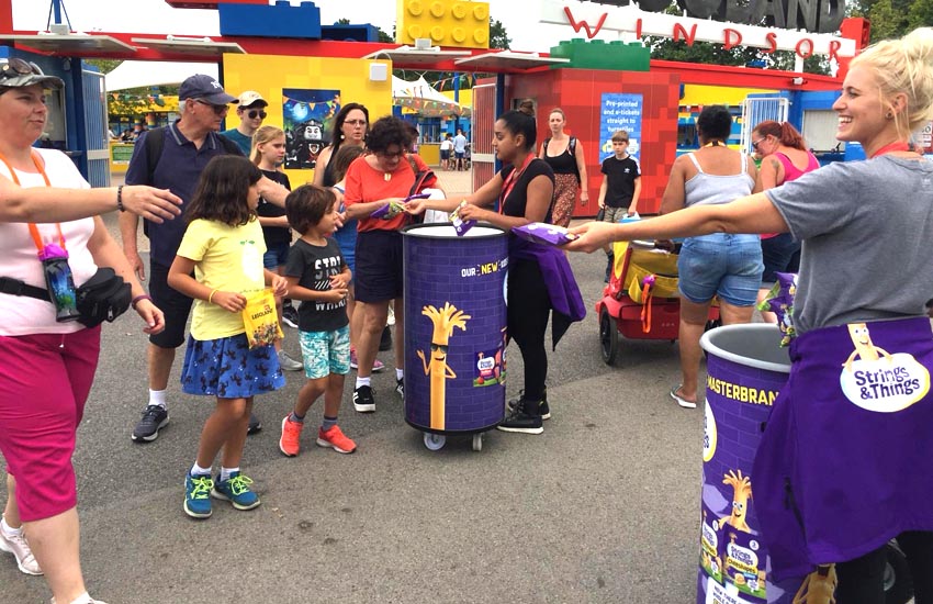 iMP consumer theme park sampling campaign for Strings 'N' Things Hand to hand product sampling campaign at theme parks
