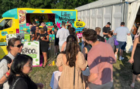 Product demonstration during a live sampling campaign to encourage consumer trial