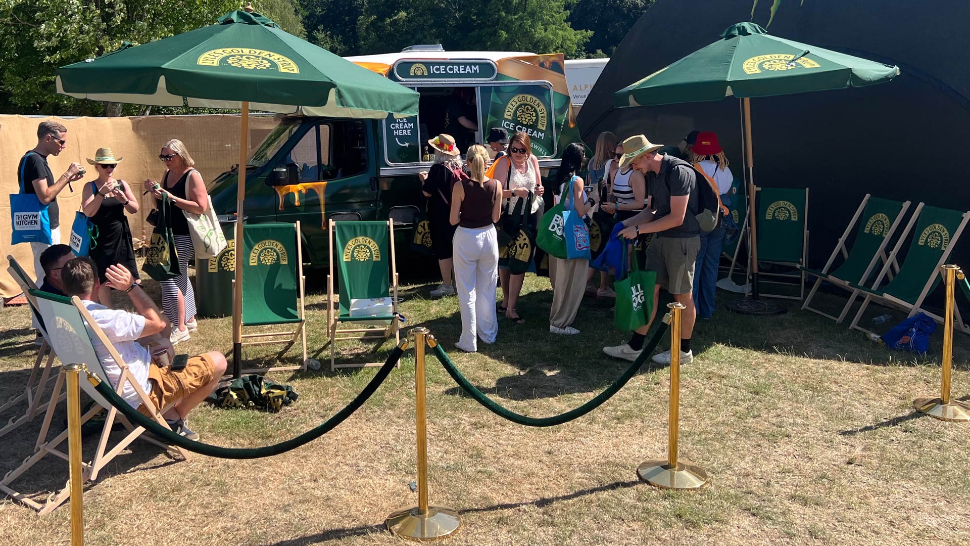 High-engagement pop-up zone at Barcode Festival with branded seating and promotional tote bags.